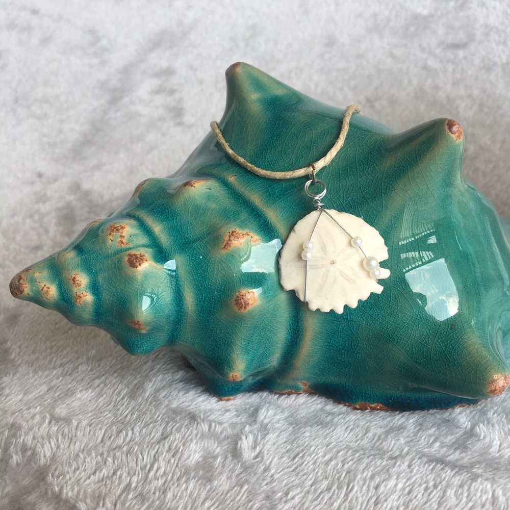 Handmade fossilized sand dollar necklace